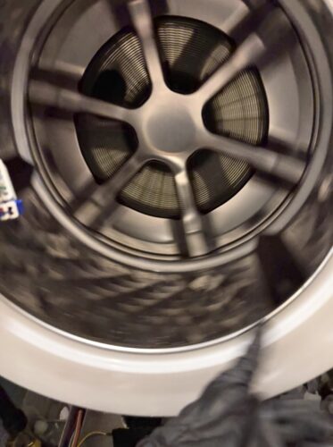 パナソニックLX修理箇所の確認のためドラムを手で回しているところ